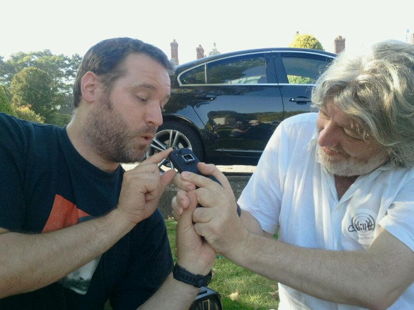 Billt and Documentally fighting over a beer bottle opener